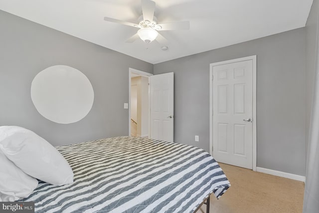 bedroom featuring carpet floors, baseboards, and ceiling fan