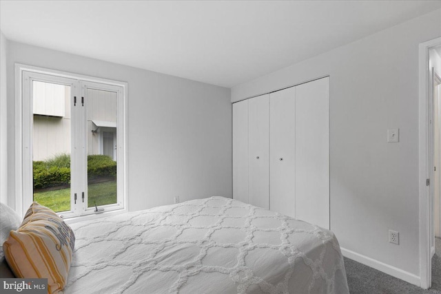 11801 Cherry Grove Dr, Gaithersburg, MD 20878 - carpeted bedroom featuring a closet and baseboards