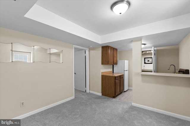 11801 Cherry Grove Dr, Gaithersburg, MD 20878 - finished basement featuring freestanding refrigerator, light carpet, a sink, and baseboards