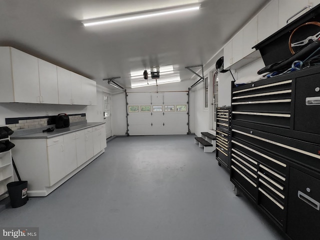 11801 Cherry Grove Dr, Gaithersburg, MD 20878 - garage featuring a garage door opener