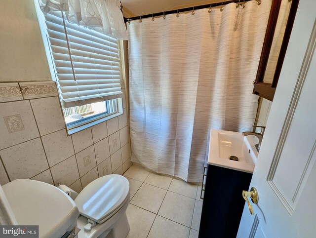 460 Burmont Rd, Drexel Hill, PA 19026 - full bathroom featuring vanity, curtained shower, toilet, tile walls, and tile patterned floors