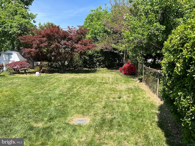 view of yard with fence