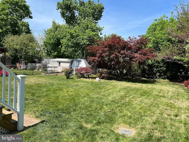 view of yard with fence