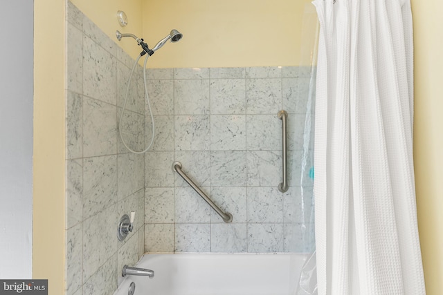 full bath featuring shower / bath combo with shower curtain