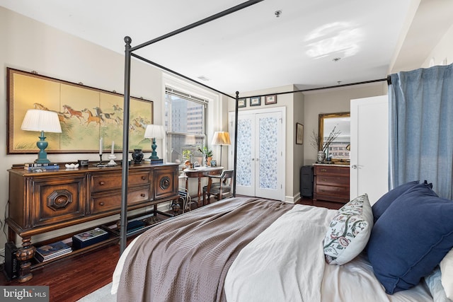 bedroom featuring wood finished floors