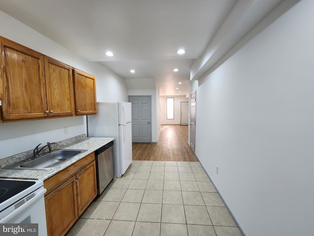 kitchen with stainless steel dishwasher, brown cabinets, a sink, recessed lighting, and light tile patterned flooring