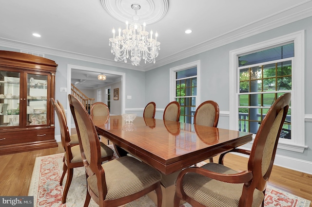 2812 Pheasant Ln, Clarksburg, MD 20871 - dining room with a chandelier, light wood-style floors, ornamental molding, recessed lighting, and baseboards