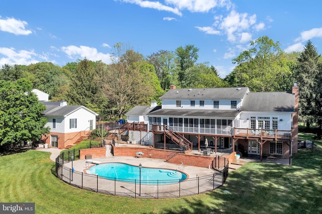 2812 Pheasant Ln, Clarksburg, MD 20871 - back of house with stairway, a wooden deck, a sunroom, a patio area, and a chimney