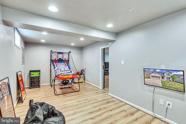 playroom with wood finished floors, baseboards, and recessed lighting