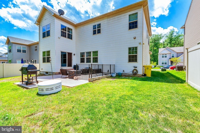 back of property with a patio area