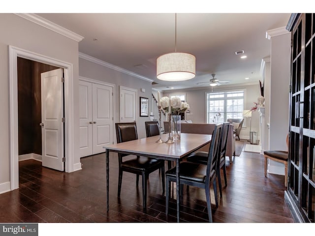 602 D St, Kennett Square, PA 19348 - dining room with crown molding, ceiling fan, dark wood finished floors, and baseboards