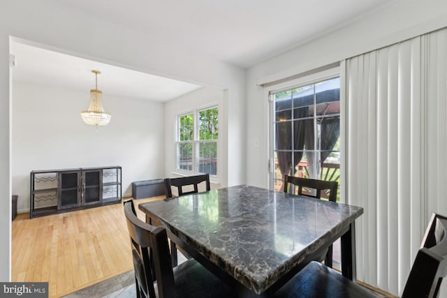 11408 Leland Pl, Waldorf, MD 20601 - dining room featuring a chandelier and light wood finished floors