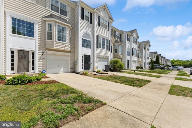 11408 Leland Pl, Waldorf, MD 20601 - view of property featuring a residential view, concrete driveway, and a garage