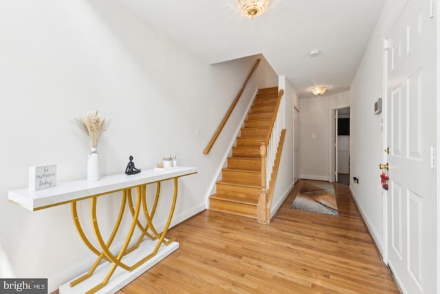 11408 Leland Pl, Waldorf, MD 20601 - foyer entrance featuring stairway, light wood finished floors, and baseboards