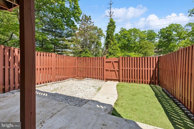 11408 Leland Pl, Waldorf, MD 20601 - fenced backyard with a gate and a patio
