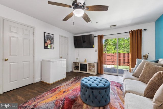 11408 Leland Pl, Waldorf, MD 20601 - living room featuring wood finished floors, a ceiling fan, and baseboards