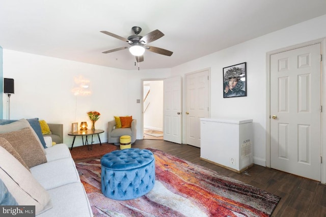 11408 Leland Pl, Waldorf, MD 20601 - living area with wood finished floors, a ceiling fan, and baseboards