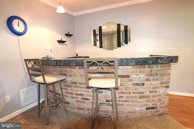 3901 Stoneybrook Rd, White Plains, MD 20695 - bar featuring visible vents, baseboards, crown molding, and bar