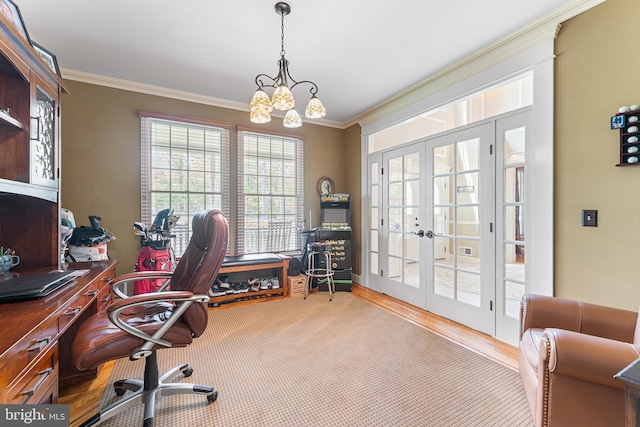 office with french doors, ornamental molding, a chandelier, and wood finished floors