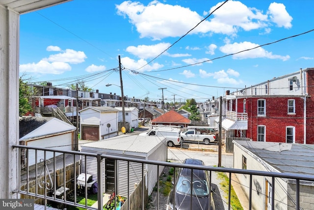 balcony featuring a residential view