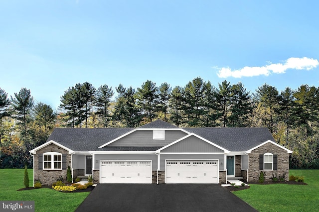 craftsman inspired home with a front yard, a garage, aphalt driveway, a shingled roof, and stone siding