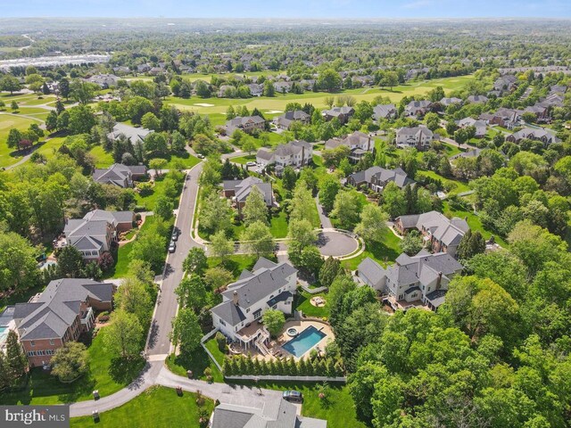 aerial view featuring golf course view and a residential view