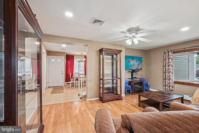 6 Swan Ln, Levittown, PA 19055 - living area with a chandelier, a ceiling fan, recessed lighting, light wood-style floors, and baseboards