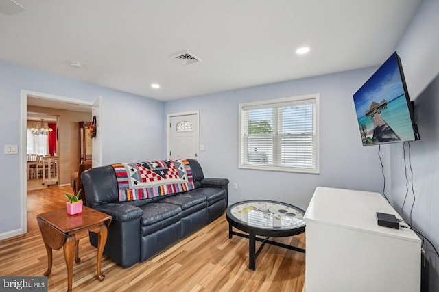 6 Swan Ln, Levittown, PA 19055 - living room featuring wood finished floors, a chandelier, and recessed lighting