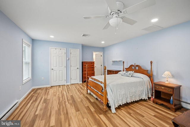 6 Swan Ln, Levittown, PA 19055 - bedroom featuring baseboard heating, light wood-type flooring, recessed lighting, baseboards, and a baseboard heating unit