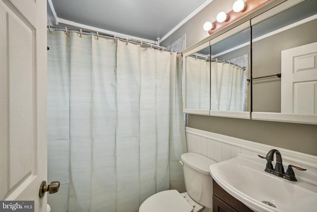 6 Swan Ln, Levittown, PA 19055 - full bathroom featuring ornamental molding, a wainscoted wall, toilet, vanity, and curtained shower