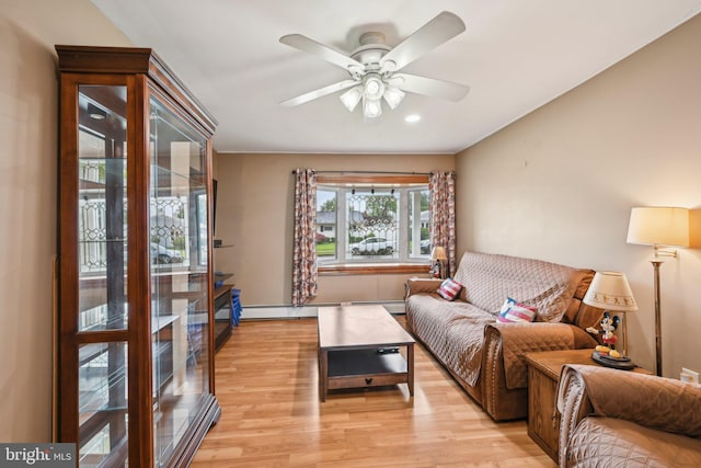 6 Swan Ln, Levittown, PA 19055 - living room featuring light wood finished floors, ceiling fan, a baseboard heating unit, and recessed lighting