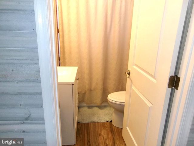8807 Fearne Ave, Baltimore, MD 21234 - bathroom with toilet, wood finished floors, and vanity