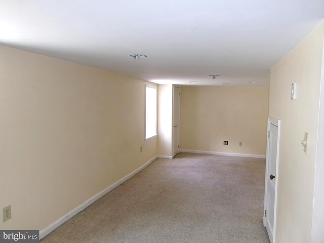 8807 Fearne Ave, Baltimore, MD 21234 - unfurnished room featuring baseboards and light carpet