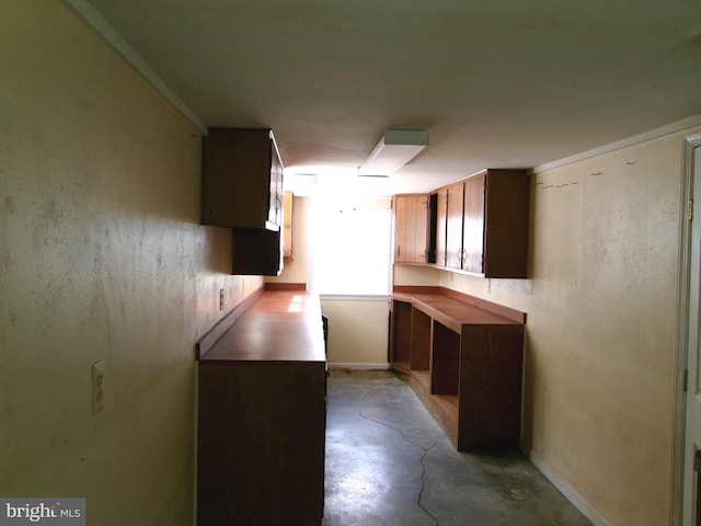 8807 Fearne Ave, Baltimore, MD 21234 - kitchen with finished concrete flooring and baseboards