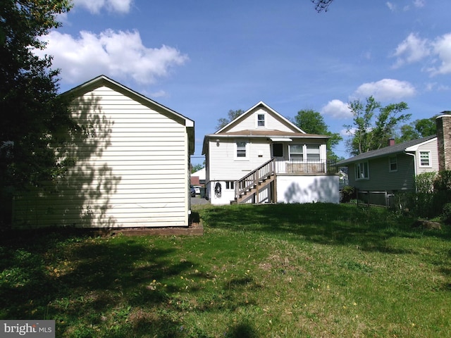 8807 Fearne Ave, Baltimore, MD 21234 - rear view of house featuring a yard