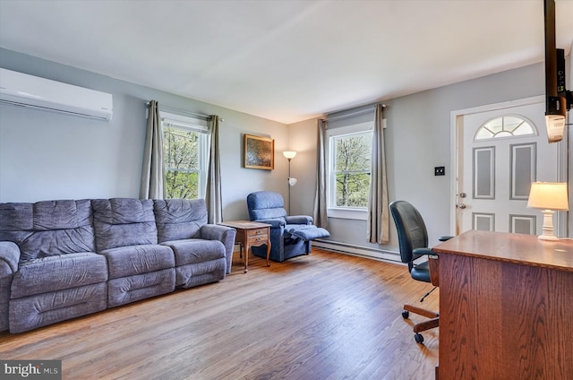 office space featuring a baseboard radiator, a wall unit AC, and wood finished floors