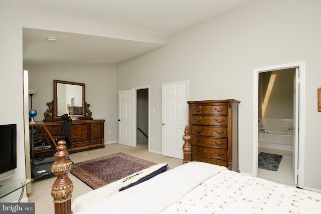 4024 Nicholas Ct, Fairfax, VA 22033 - carpeted bedroom with vaulted ceiling, ensuite bath, and baseboards
