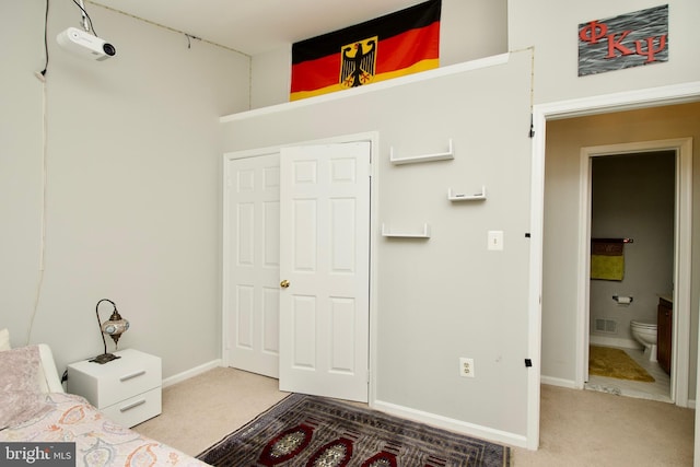 4024 Nicholas Ct, Fairfax, VA 22033 - unfurnished bedroom with light colored carpet, baseboards, and ensuite bath