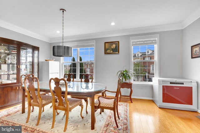 20920 Houseman Ter, Ashburn, VA 20148 - dining room with a healthy amount of sunlight and crown molding