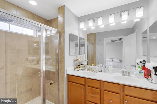 20920 Houseman Ter, Ashburn, VA 20148 - ensuite bathroom with double vanity, ceiling fan, a sink, and a stall shower