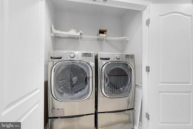20920 Houseman Ter, Ashburn, VA 20148 - laundry area featuring washer and dryer and laundry area