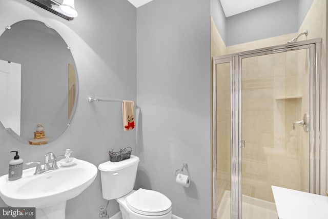 20920 Houseman Ter, Ashburn, VA 20148 - bathroom with a sink, a stall shower, and toilet