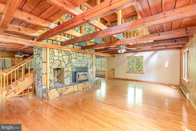 unfurnished living room featuring a ceiling fan, wood finished floors, and a baseboard radiator