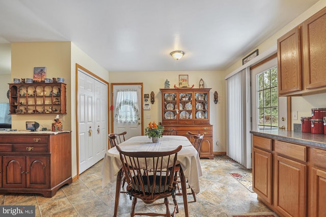dining room featuring stone finish floor