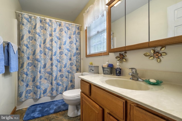 full bath featuring vanity, shower / bath combo, and toilet