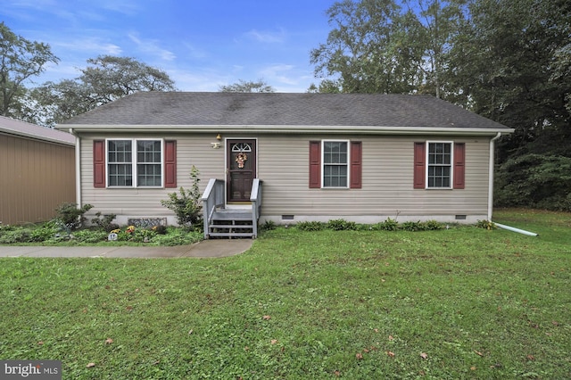 view of front of home with crawl space, roof with shingles, and a front lawn