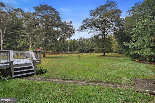 view of yard with a deck