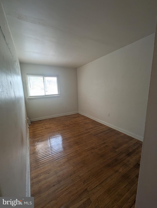 2407 S 12th St, Camden, NJ 08104 - spare room with wood finished floors and baseboards