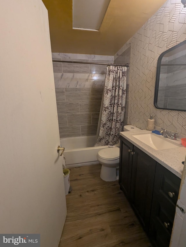 2407 S 12th St, Camden, NJ 08104 - full bathroom featuring toilet, shower / tub combo with curtain, vanity, and wood finished floors