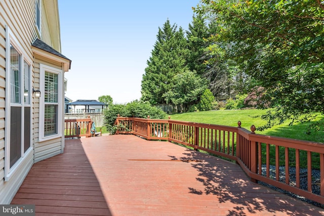 5811 Valley Vw, Alexandria, VA 22310 - wooden deck featuring a lawn